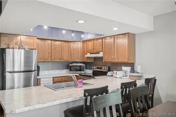 $235,000 | 37 Lone Oak Court, Unit 37, Sunrise Beach, MO 65079