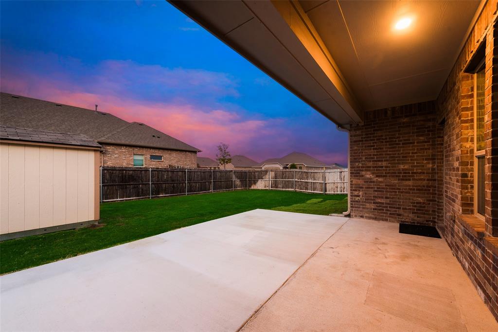 1419 Fox Hollow Road Krum, TX 76249 - Photo 27 of 29 Fenced backyard with a patio