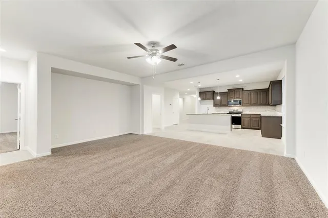a view of a kitchen with a sink and a kitchen