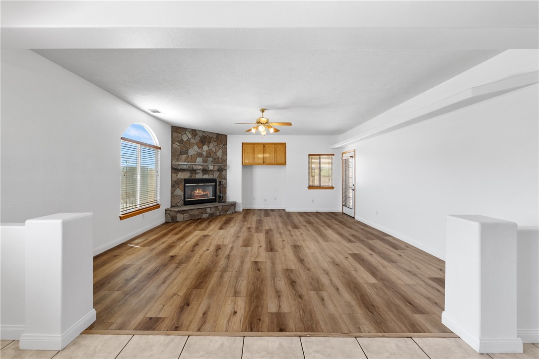 12922 Lompoc Road Apple Valley, CA 92308 - Photo 10 of 33 family room with cozy fireplace