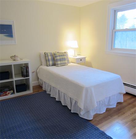 221 Lincoln Road Lincoln, MA 01773 - Photo 12 of 17 a bedroom with a bed and a window