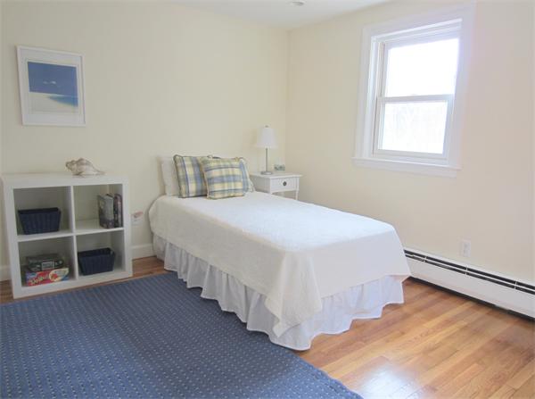 221 Lincoln Road Lincoln, MA 01773 - Photo 15 of 17 a bedroom with a bed and a window