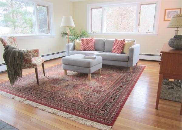 221 Lincoln Road Lincoln, MA 01773 - Photo 4 of 17 a living room with furniture and a rug