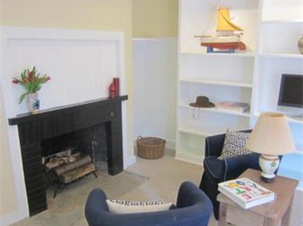 221 Lincoln Road Lincoln, MA 01773 - Photo 5 of 17 a living room with furniture and a fireplace
