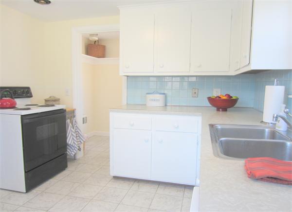 221 Lincoln Road Lincoln, MA 01773 - Photo 10 of 17 a utility room with sink dryer and washer