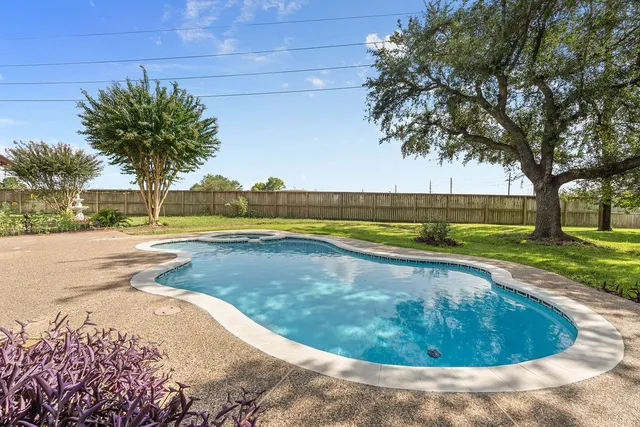 an aerial view of a house with a garden