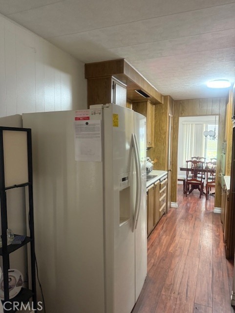 3050 West Ball Road, Unit 171 Anaheim, CA 92804 - Photo 7 of 15 a walk in closet with wooden floor