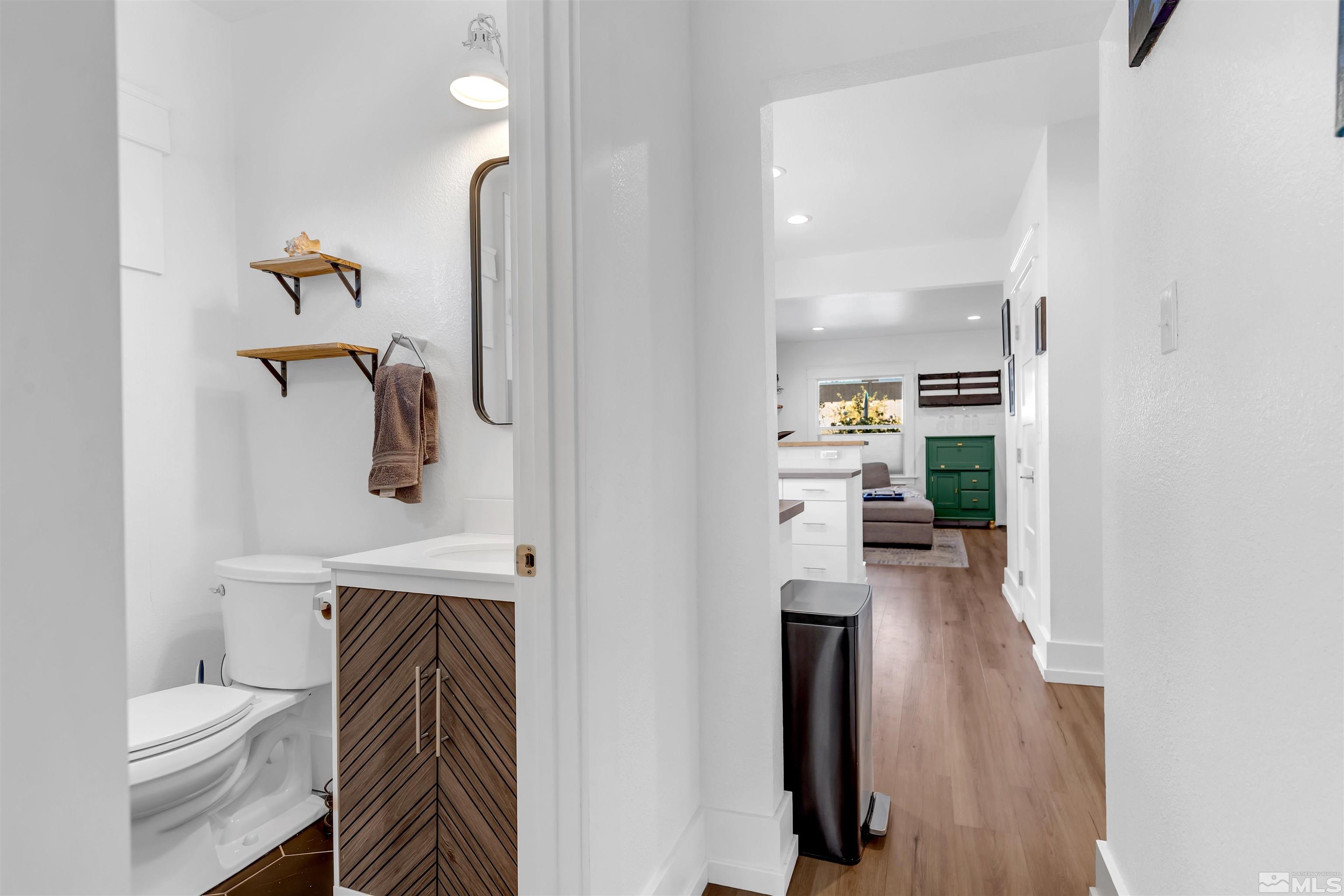 128 Stewart Street Reno, NV 89501 - Photo 13 of 24 a bathroom with a toilet and a shower