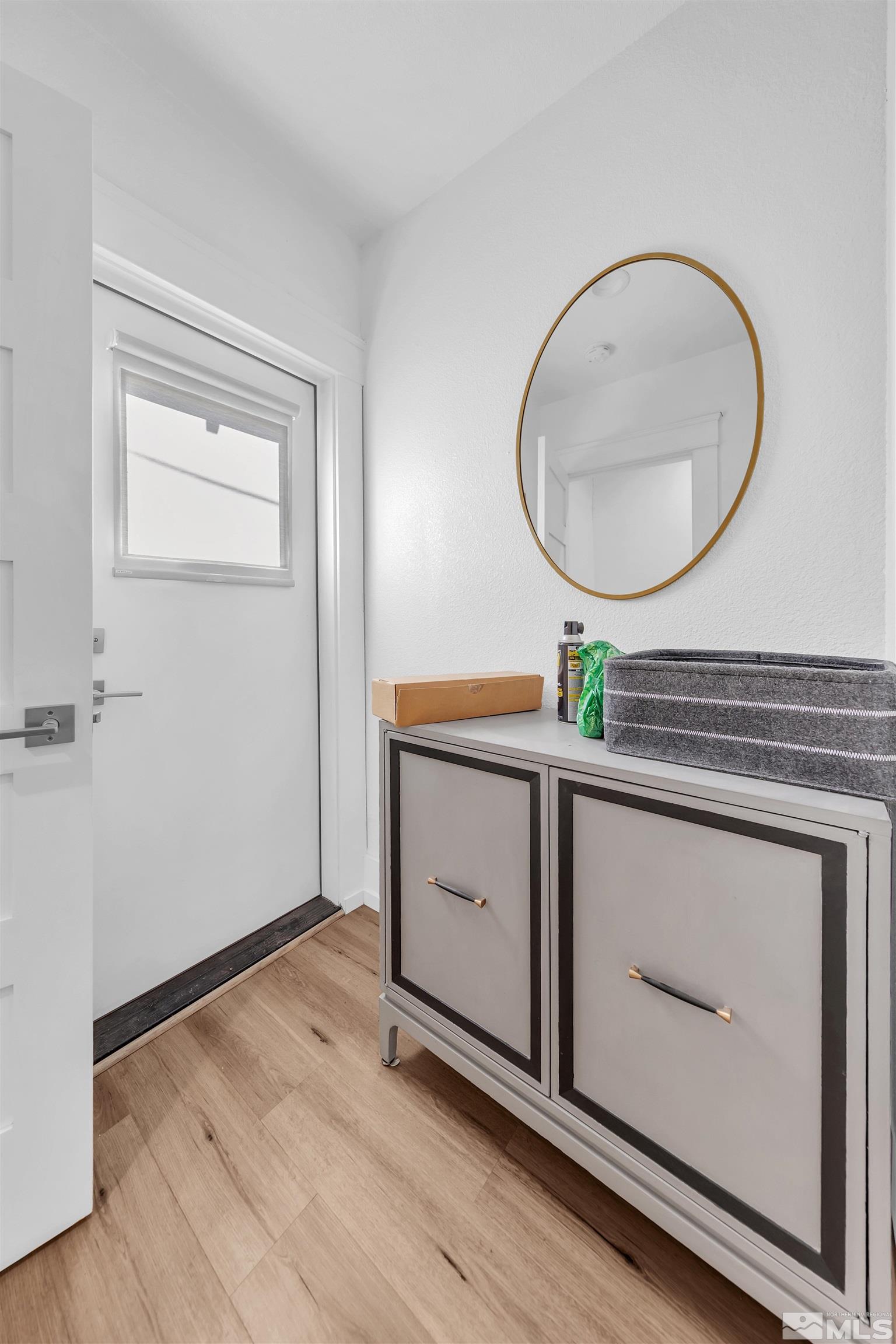 128 Stewart Street Reno, NV 89501 - Photo 17 of 24 a sink with a mirror