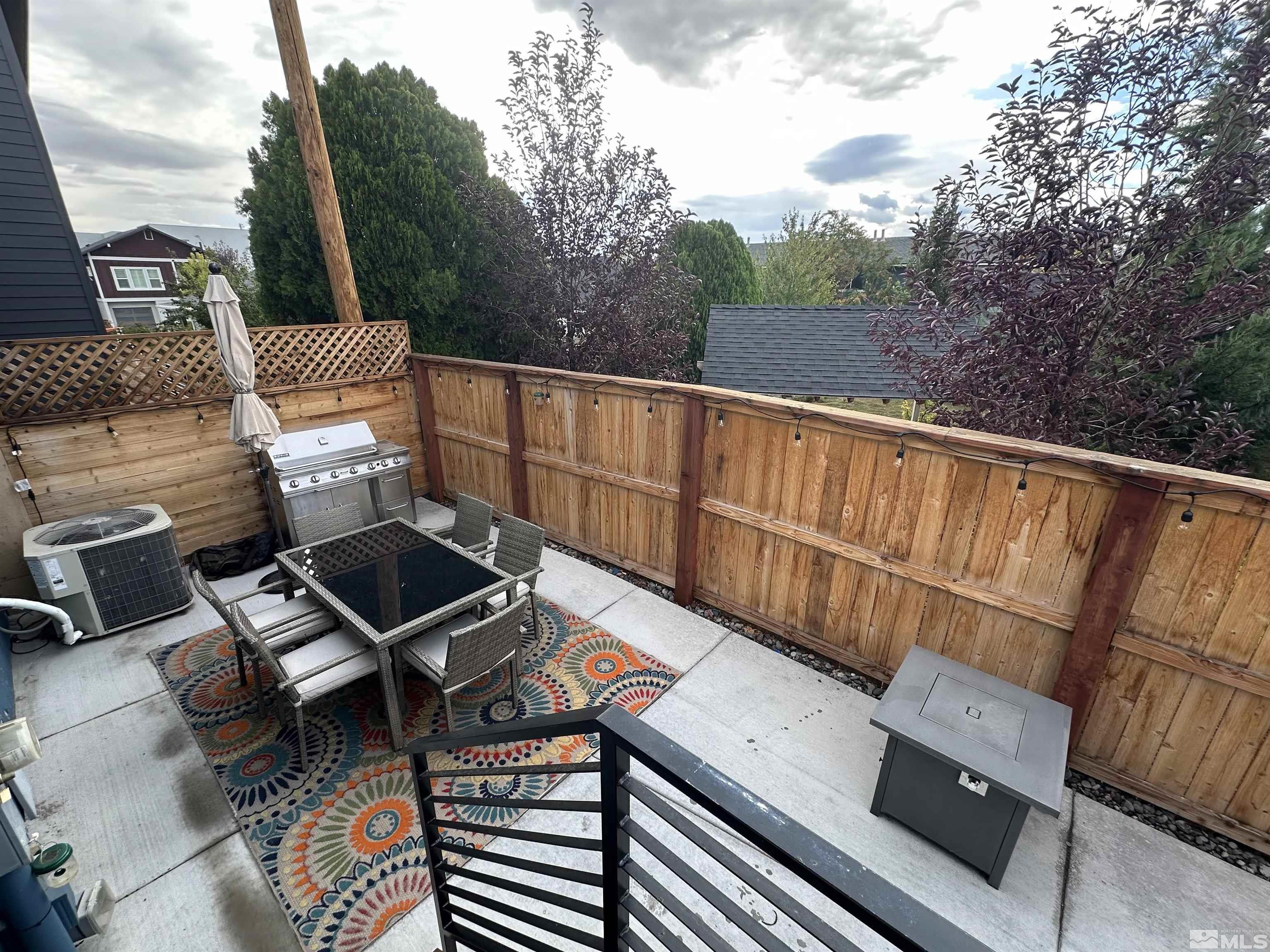 128 Stewart Street Reno, NV 89501 - Photo 3 of 24 a view of a chairs and table in the balcony