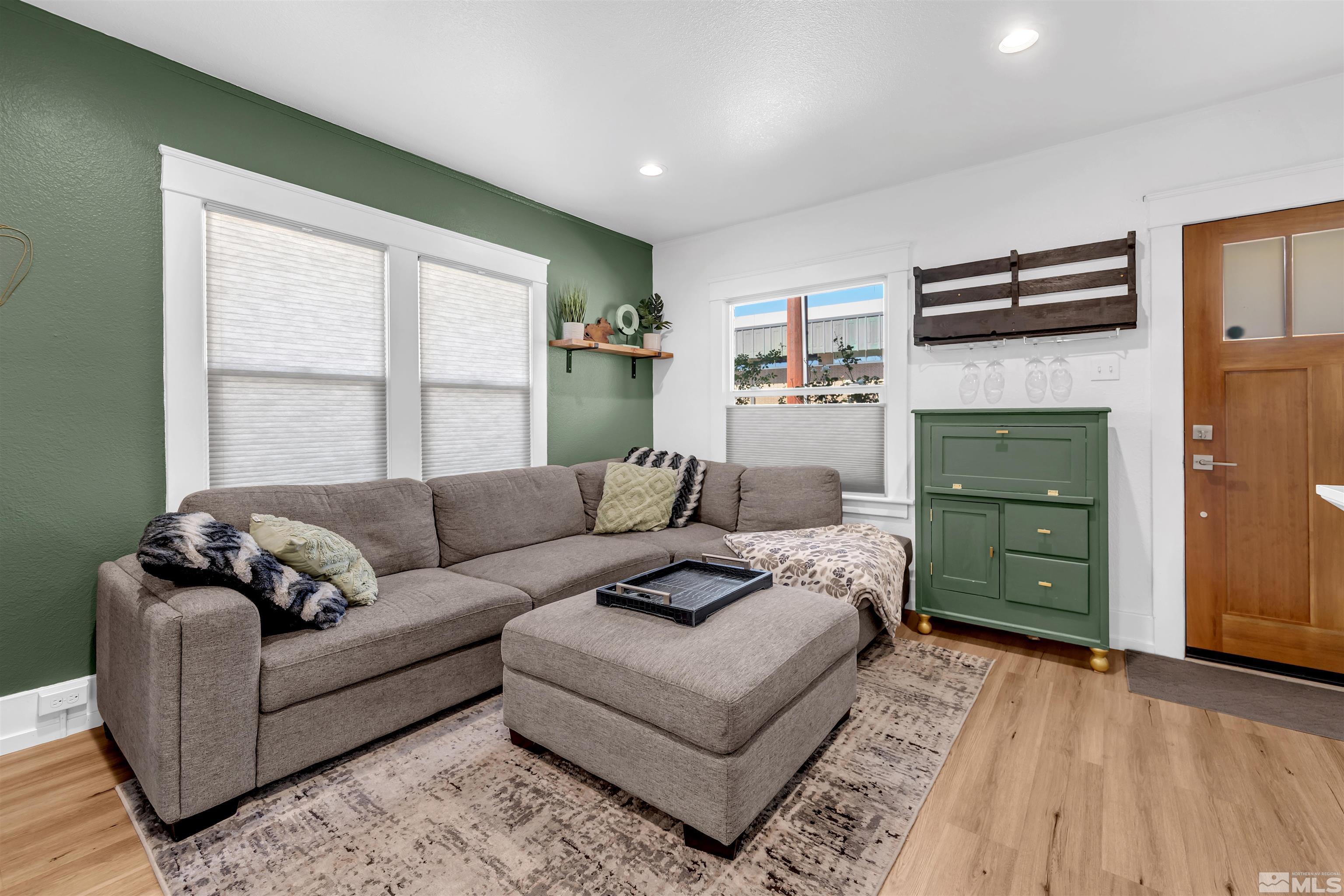 128 Stewart Street Reno, NV 89501 - Photo 8 of 24 a living room with furniture and a window