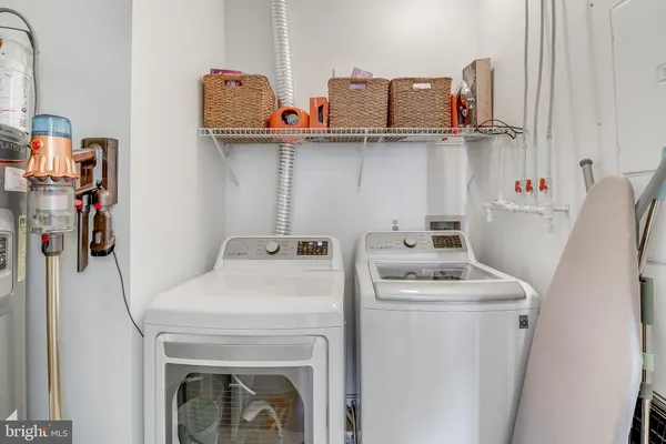 a view of a balcony with wooden floor