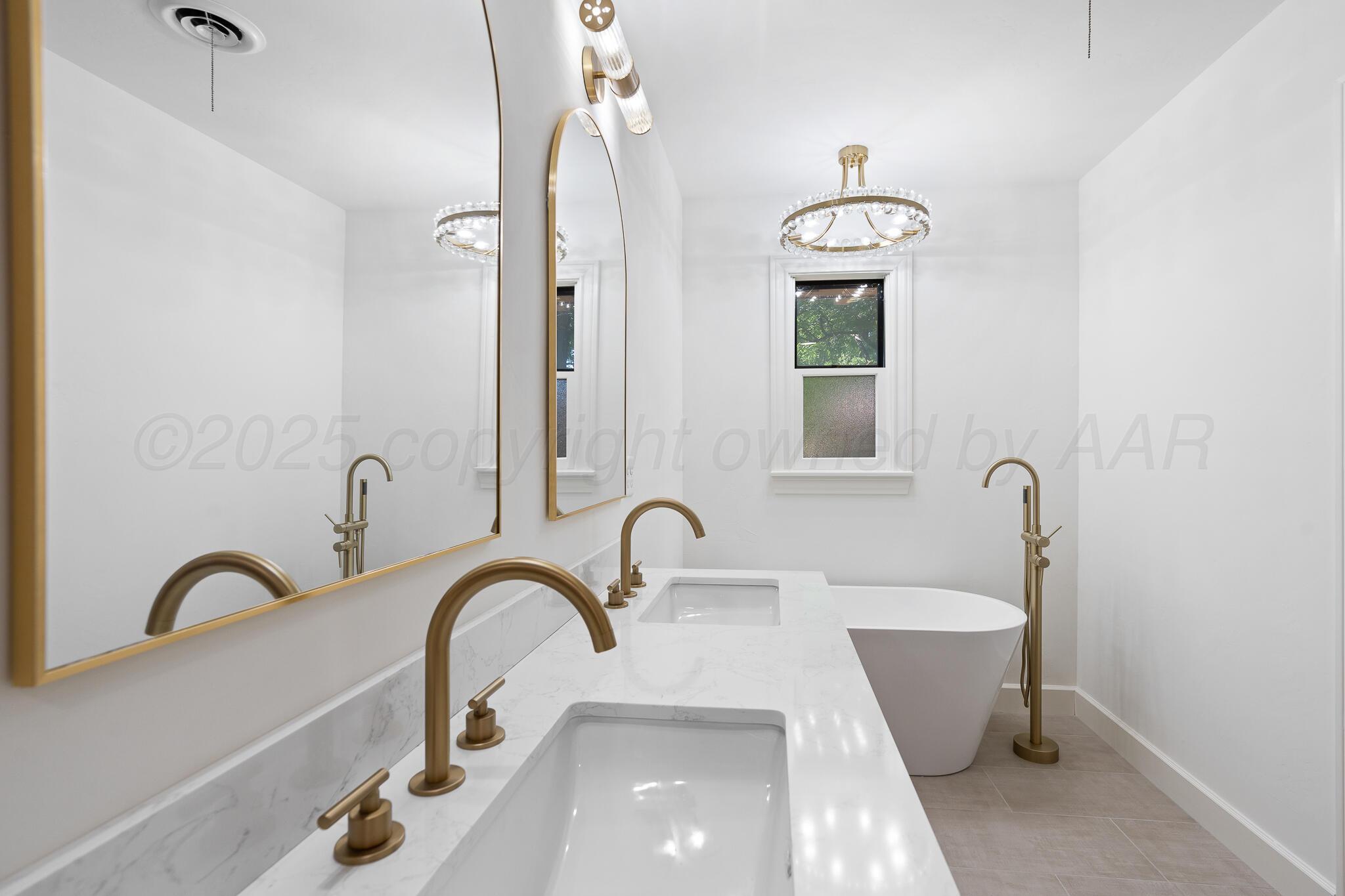 3804 Doris Drive Amarillo, TX 79109 - Photo 28 of 53 a bathroom with a sink and a bathtub