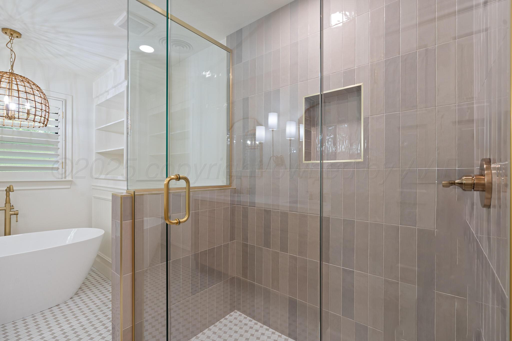 3804 Doris Drive Amarillo, TX 79109 - Photo 41 of 53 a bathroom with a bathtub and shower