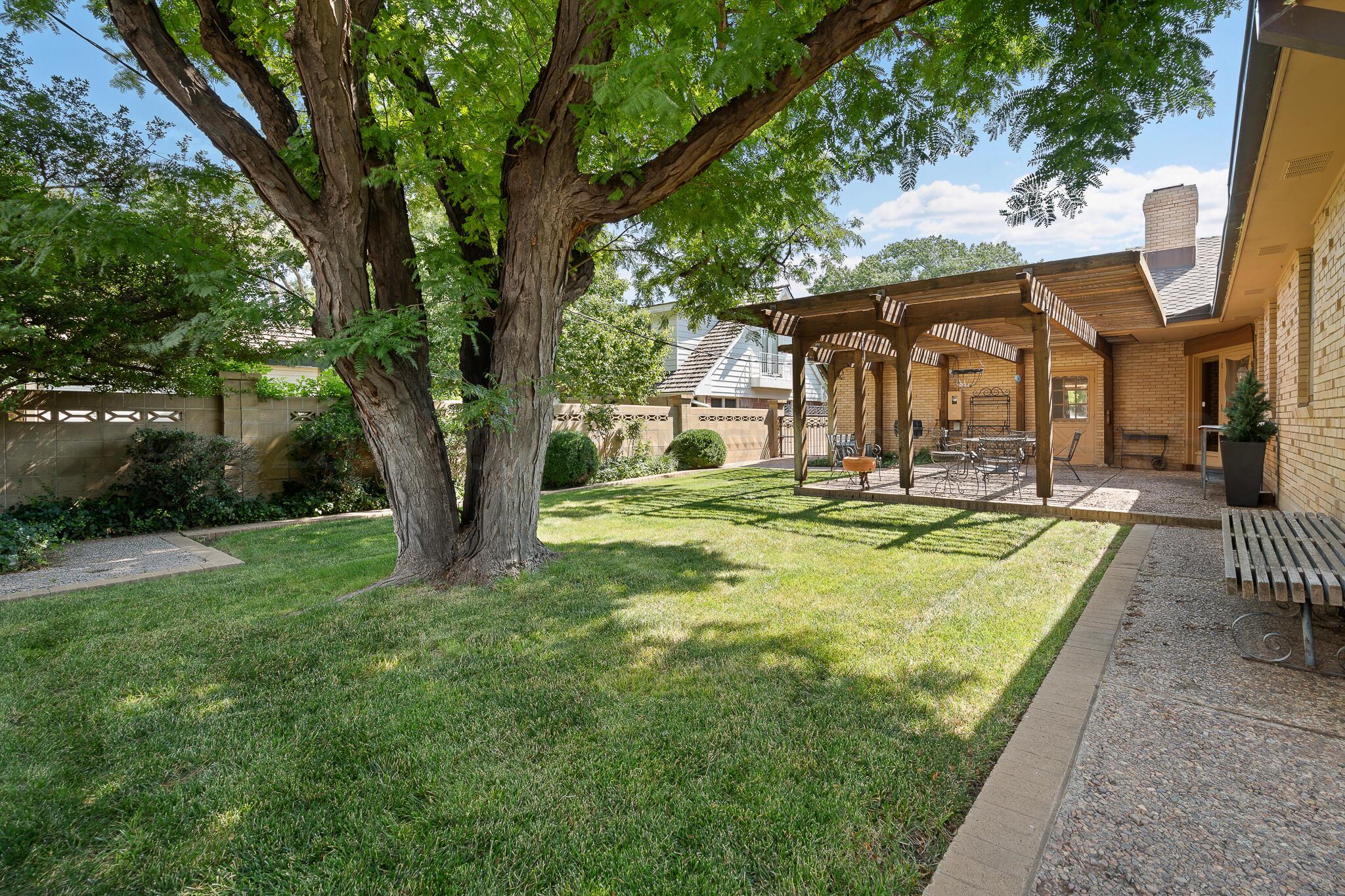 3804 Doris Drive Amarillo, TX 79109 - Photo 48 of 53 a view of a house with swimming pool and a yard