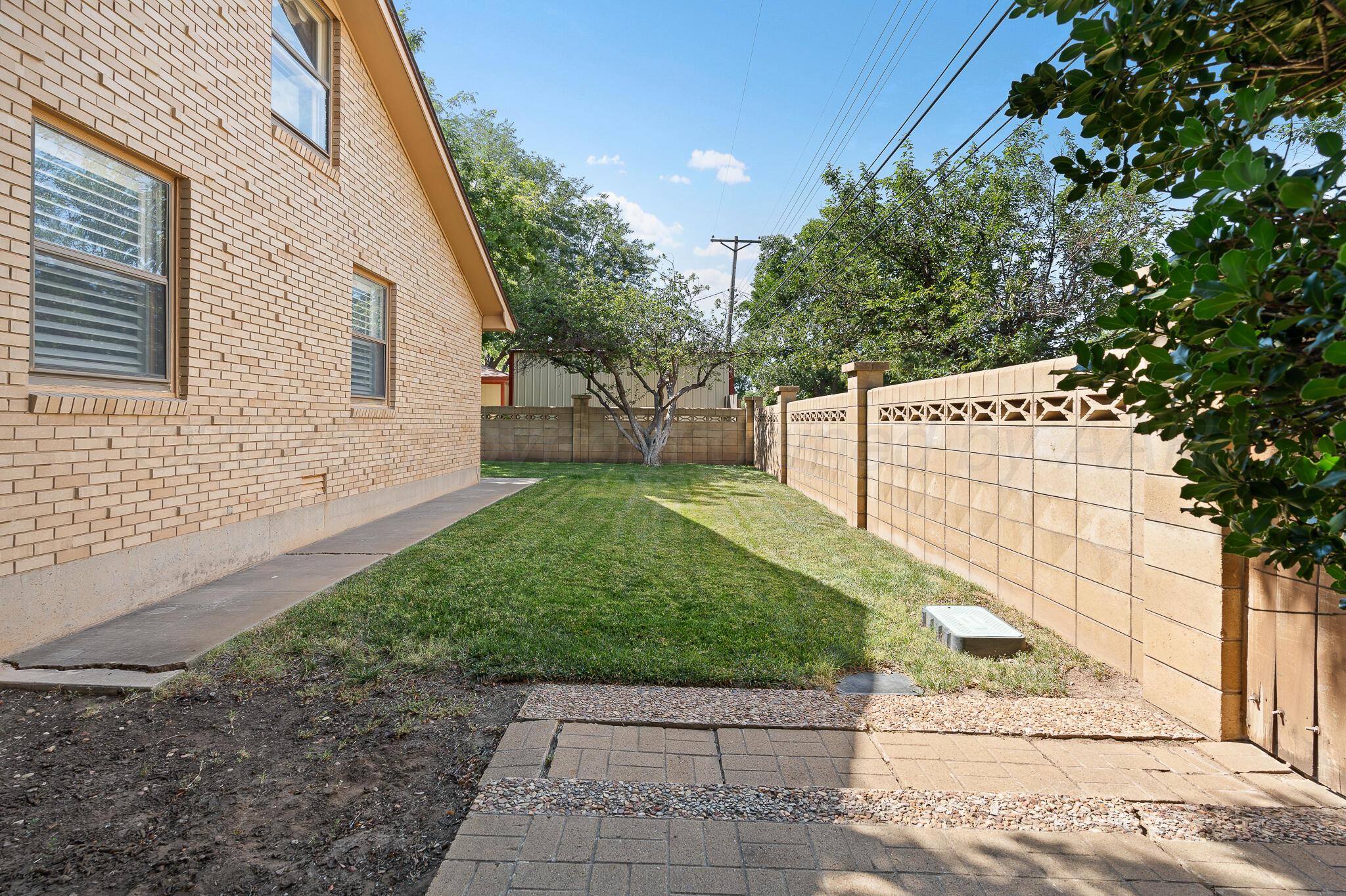 3804 Doris Drive Amarillo, TX 79109 - Photo 49 of 53 a view of backyard with a small cabin