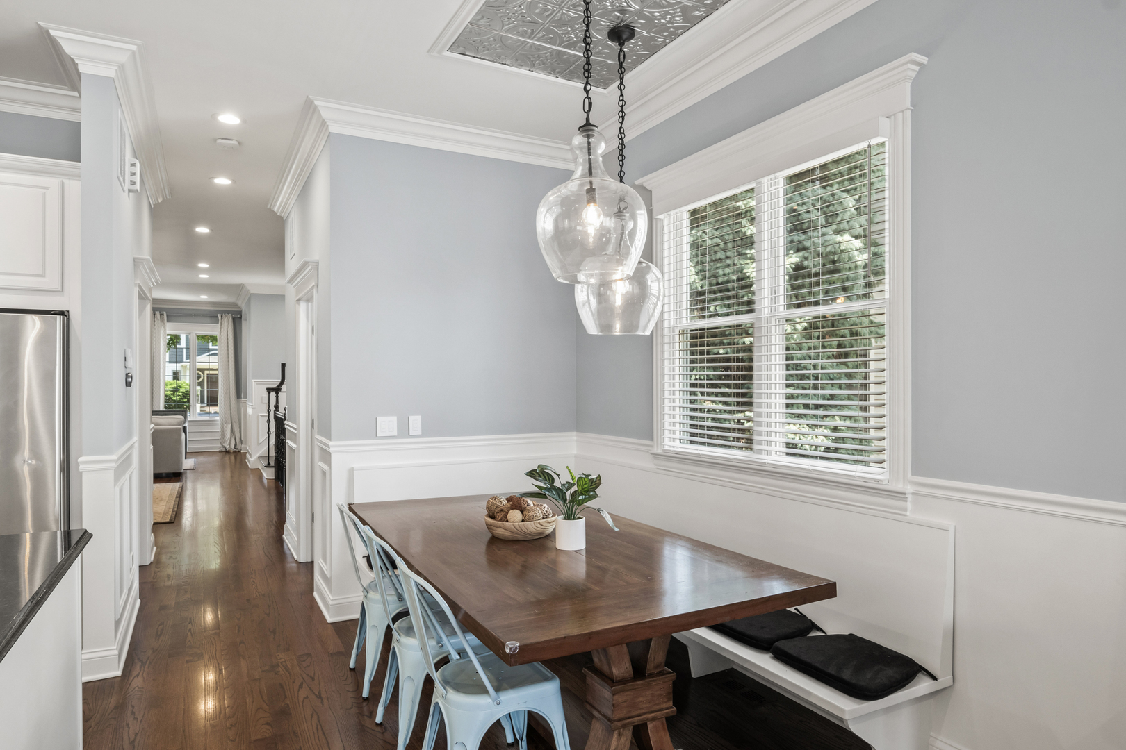3743 North Ridgeway Avenue Chicago, IL 60618 - Photo 16 of 65 a view of a dining room with furniture window and wooden floor