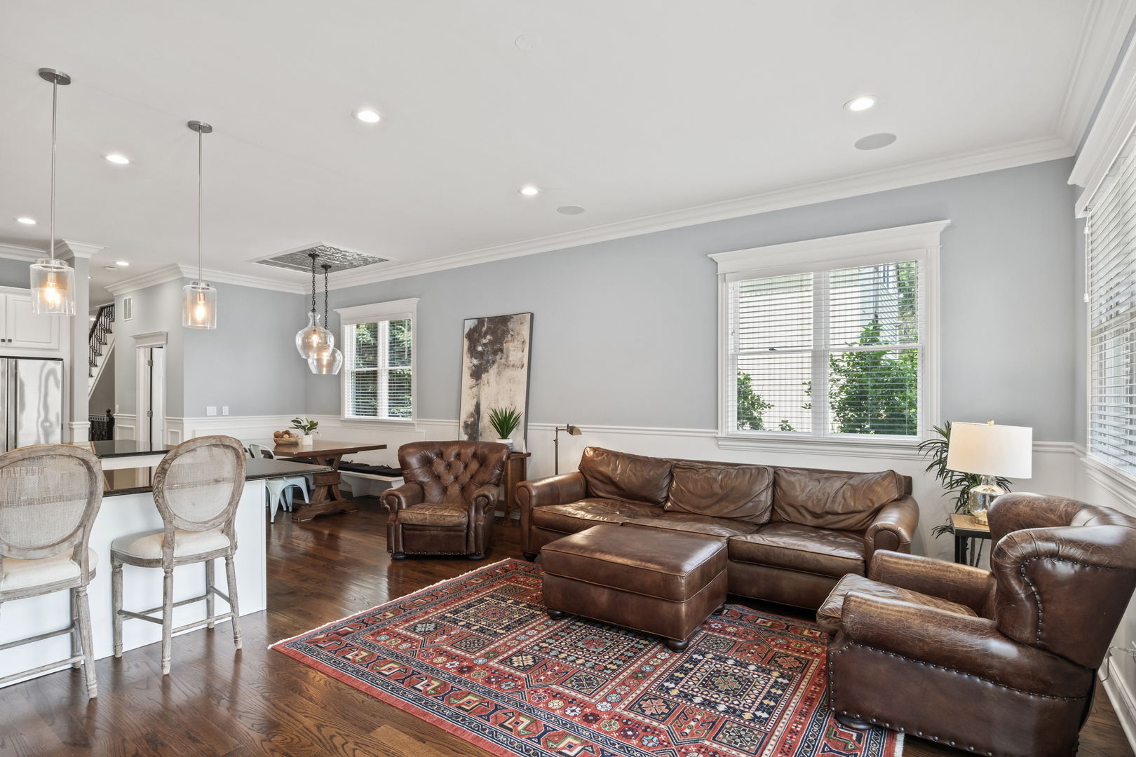 3743 North Ridgeway Avenue Chicago, IL 60618 - Photo 19 of 65 a living room with furniture potted plant and open kitchen view