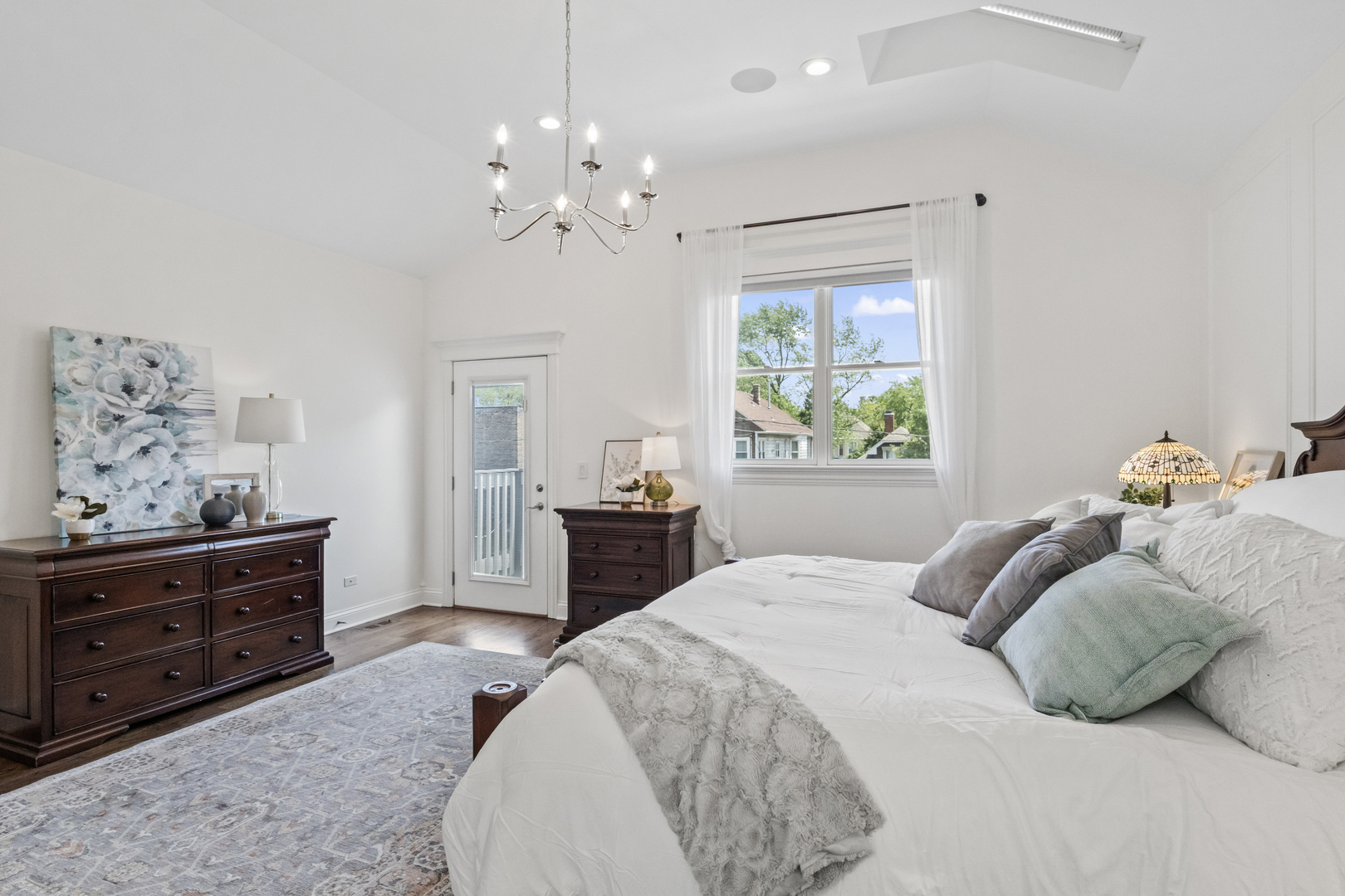 3743 North Ridgeway Avenue Chicago, IL 60618 - Photo 27 of 65 a bedroom with a bed and a dresser