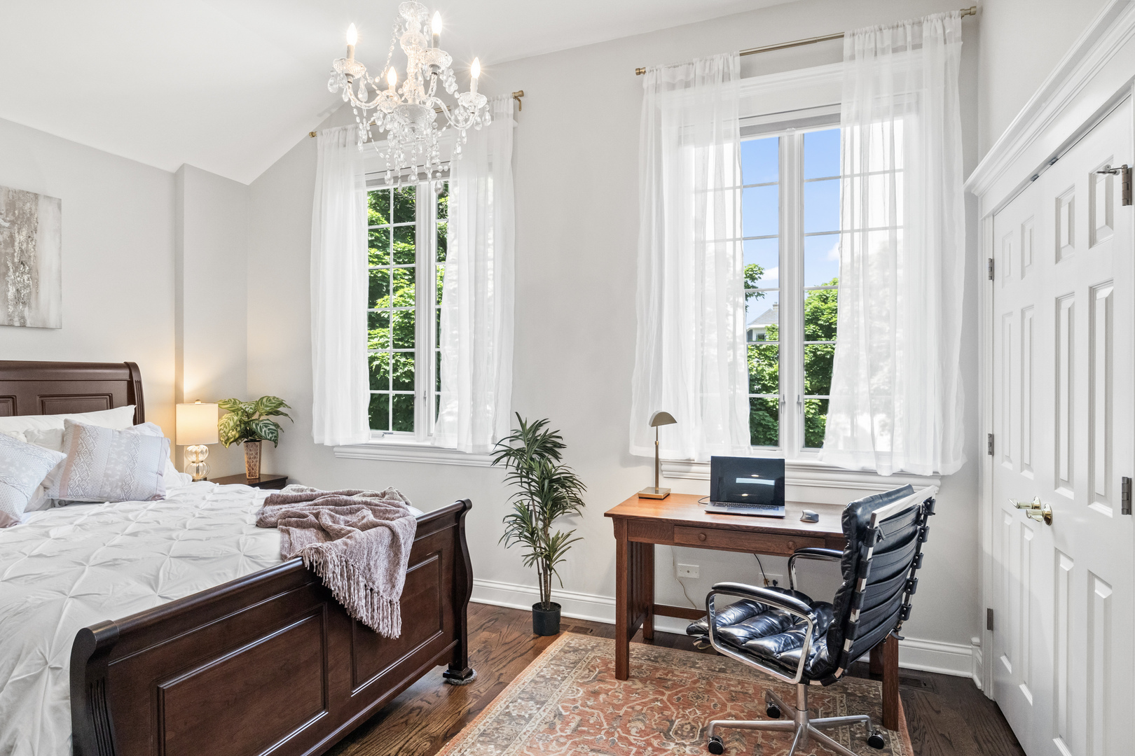 3743 North Ridgeway Avenue Chicago, IL 60618 - Photo 33 of 65 a bedroom with a bed and a table chair