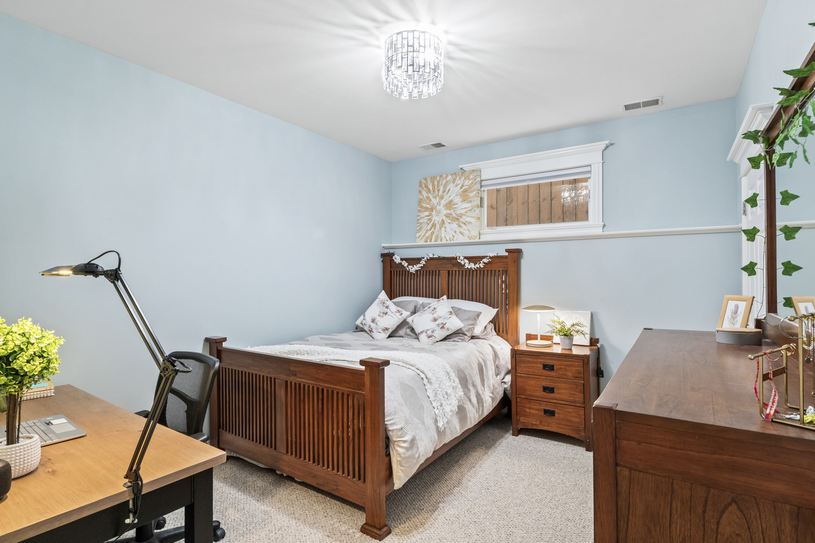 3743 North Ridgeway Avenue Chicago, IL 60618 - Photo 44 of 65 a bedroom with a bed and a table in it