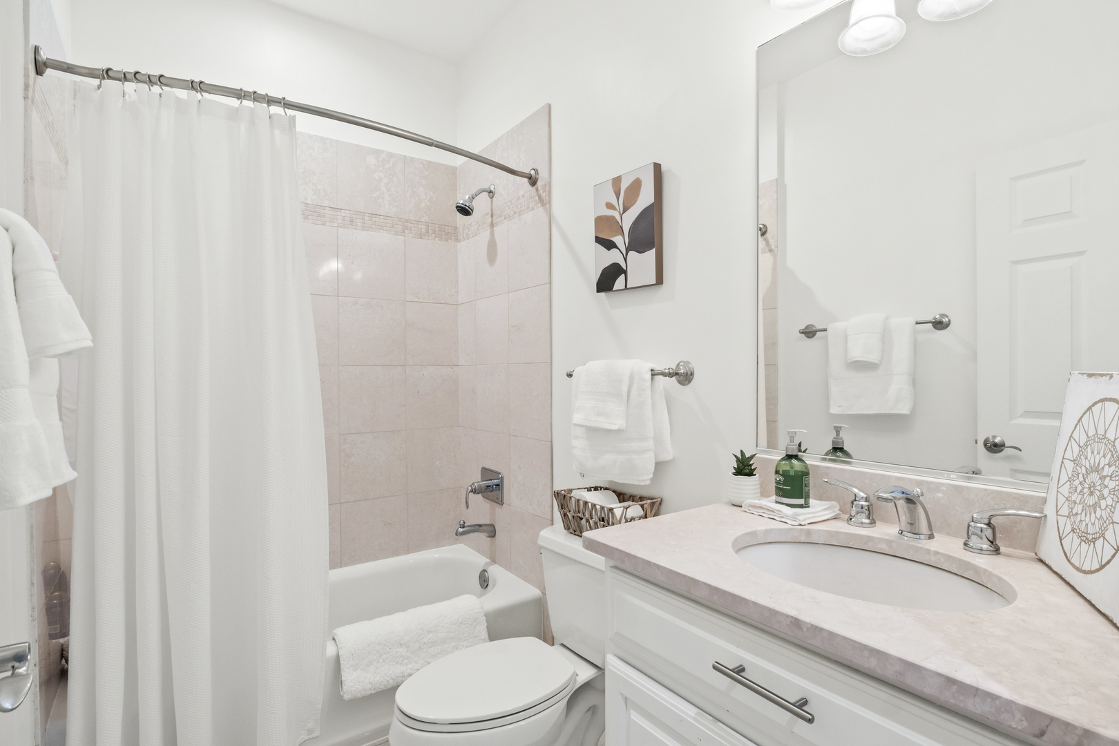 3743 North Ridgeway Avenue Chicago, IL 60618 - Photo 48 of 65 a bathroom with a sink a toilet and a large mirror
