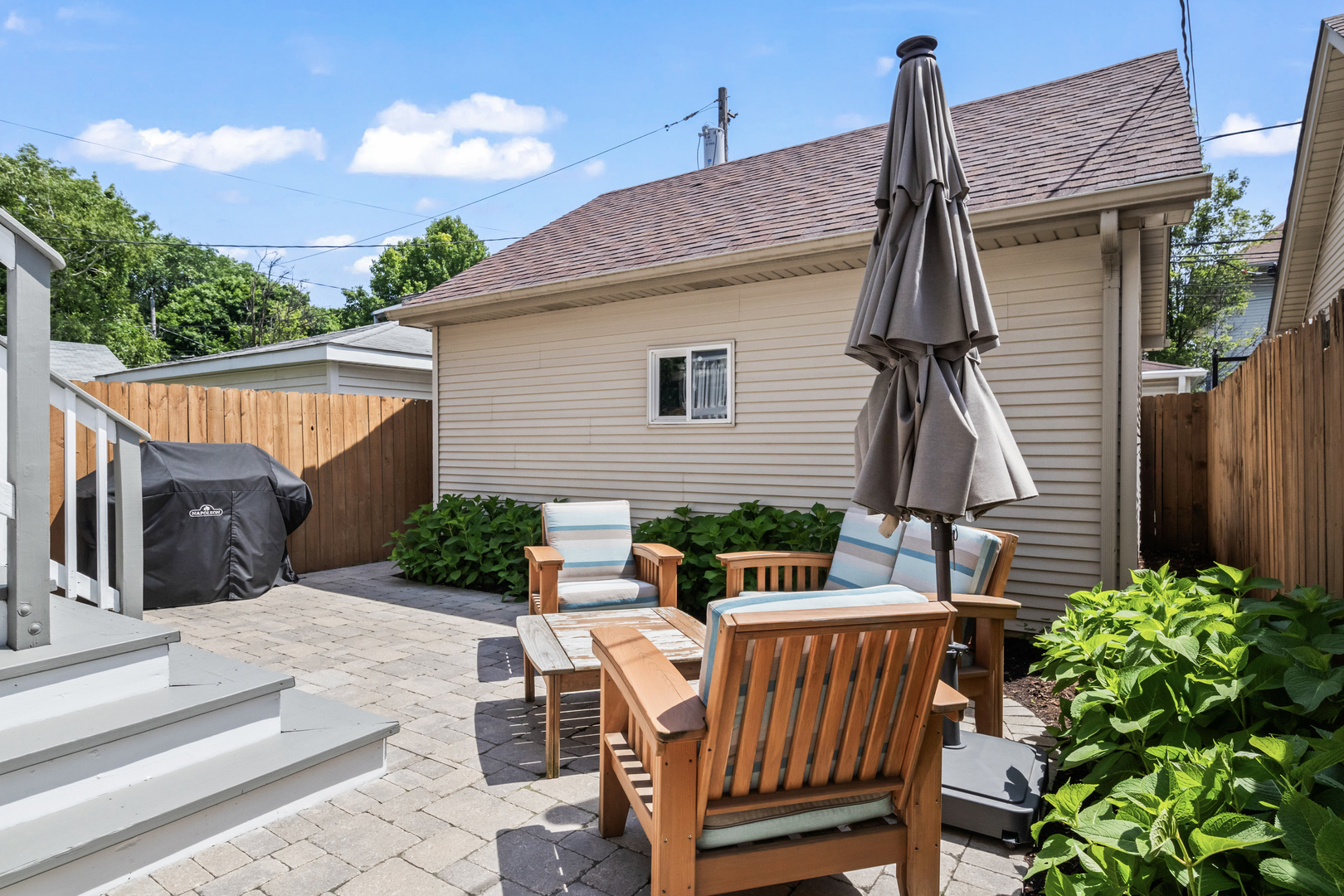 3743 North Ridgeway Avenue Chicago, IL 60618 - Photo 49 of 65 a view of backyard with outdoor seating and plants