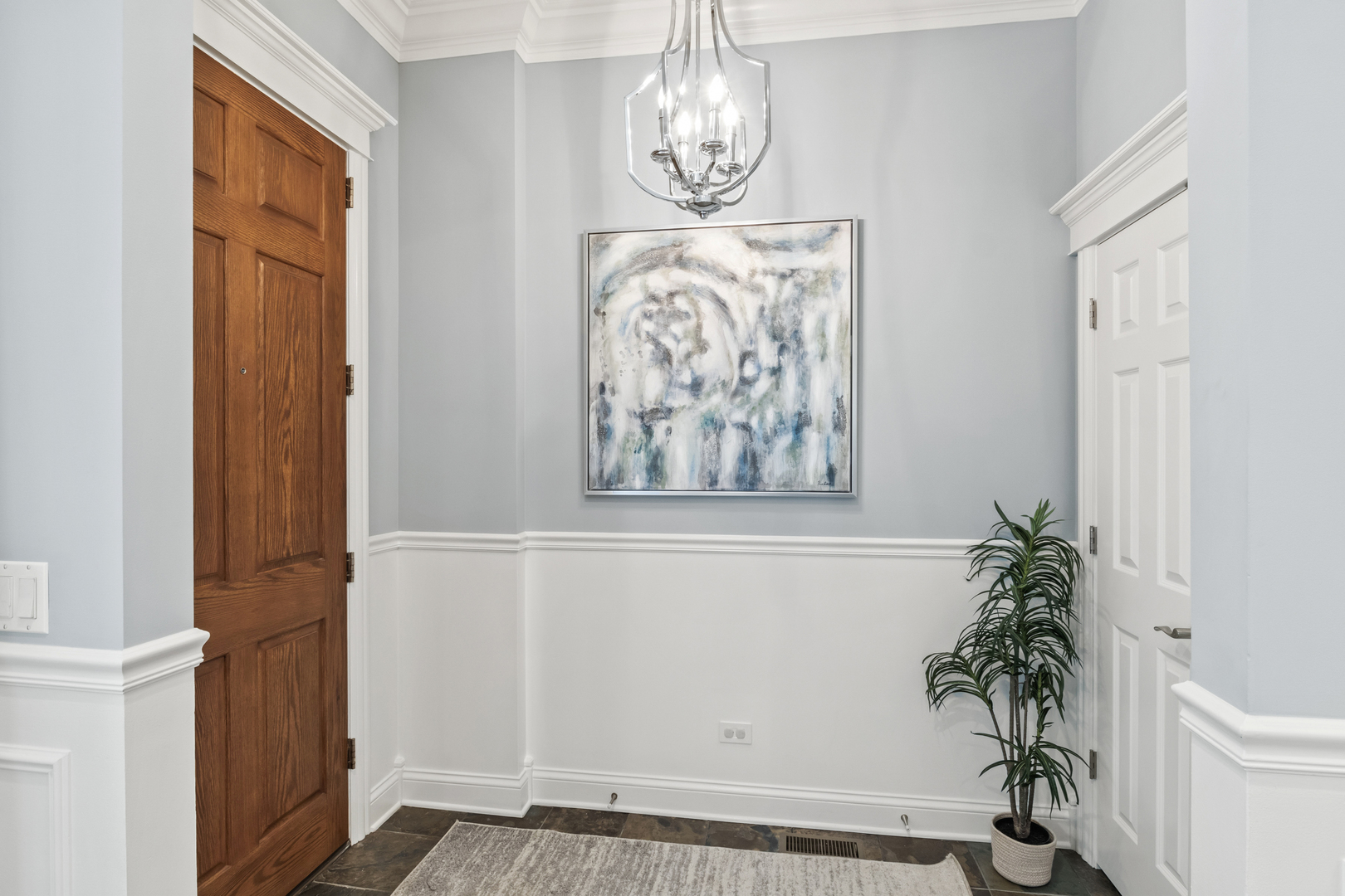 3743 North Ridgeway Avenue Chicago, IL 60618 - Photo 5 of 65 a view of front door with wooden floor