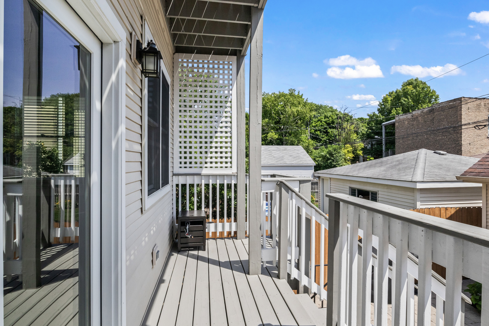 3743 North Ridgeway Avenue Chicago, IL 60618 - Photo 52 of 65 a view of a house with a deck