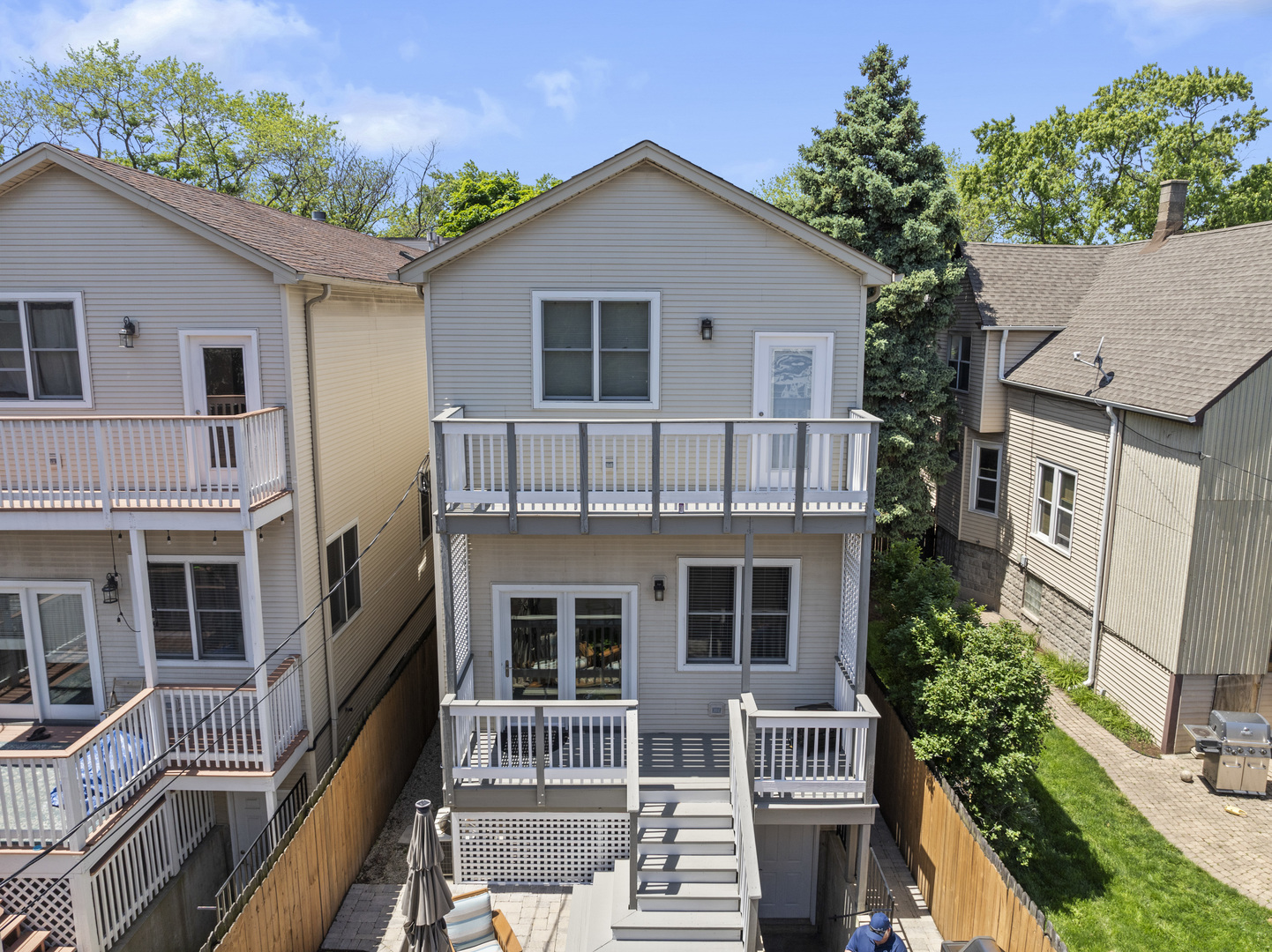 3743 North Ridgeway Avenue Chicago, IL 60618 - Photo 55 of 65 a front view of a house with a yard