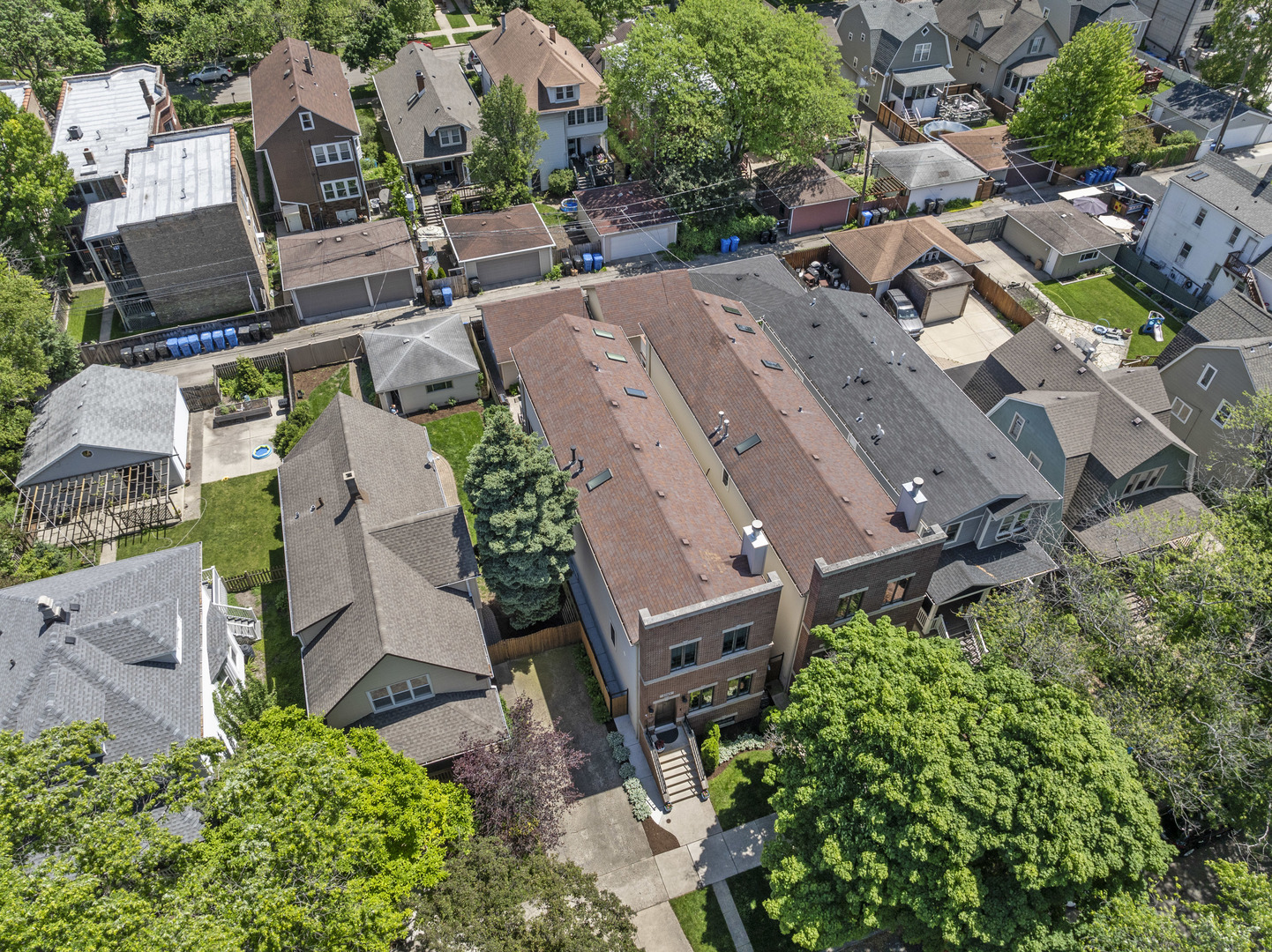3743 North Ridgeway Avenue Chicago, IL 60618 - Photo 58 of 65 an aerial view of multiple houses with yard