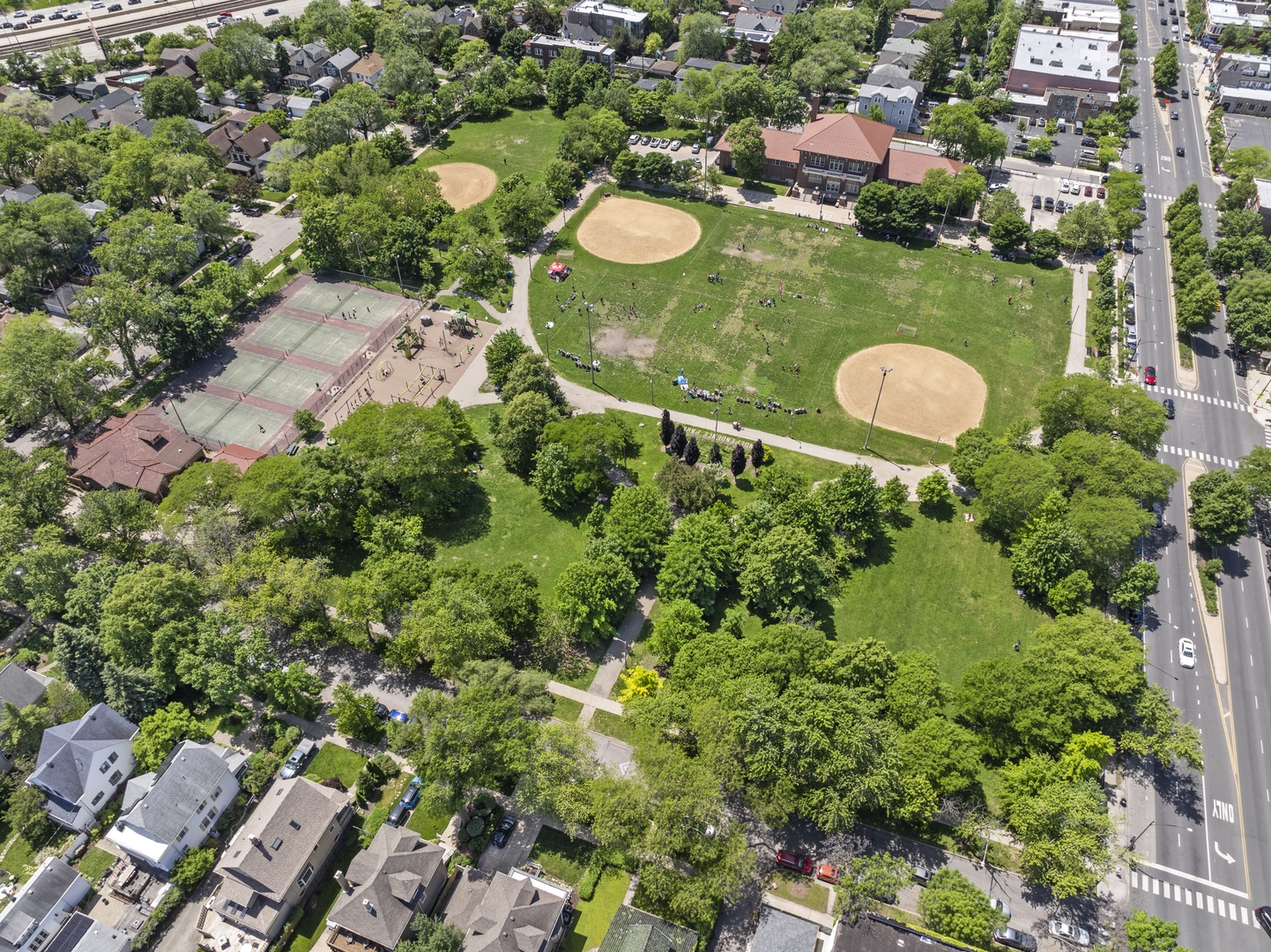 3743 North Ridgeway Avenue Chicago, IL 60618 - Photo 65 of 65 an aerial view of a residential houses with yard and swimming pool