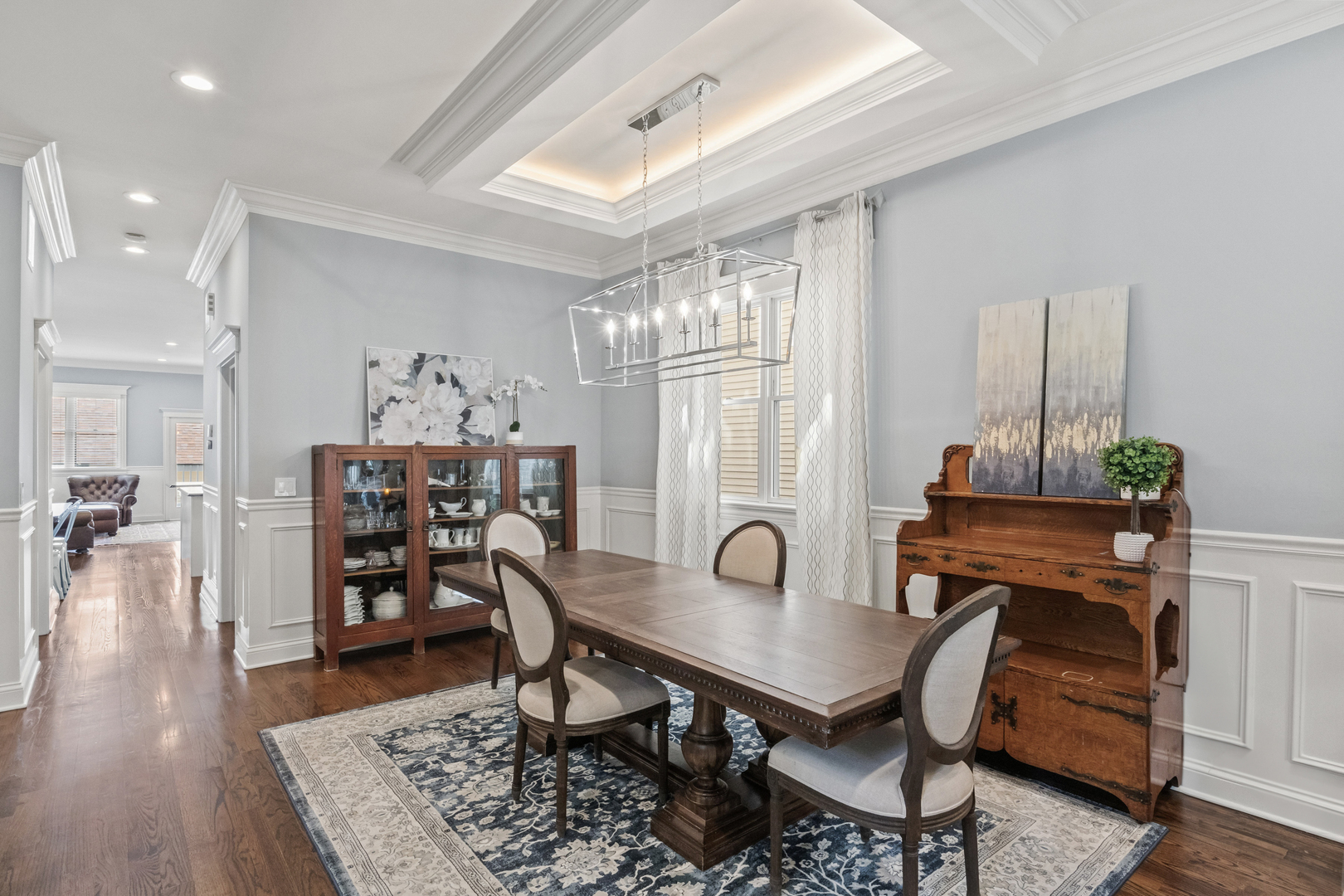 3743 North Ridgeway Avenue Chicago, IL 60618 - Photo 9 of 65 a view of a dining room with furniture and wooden floor