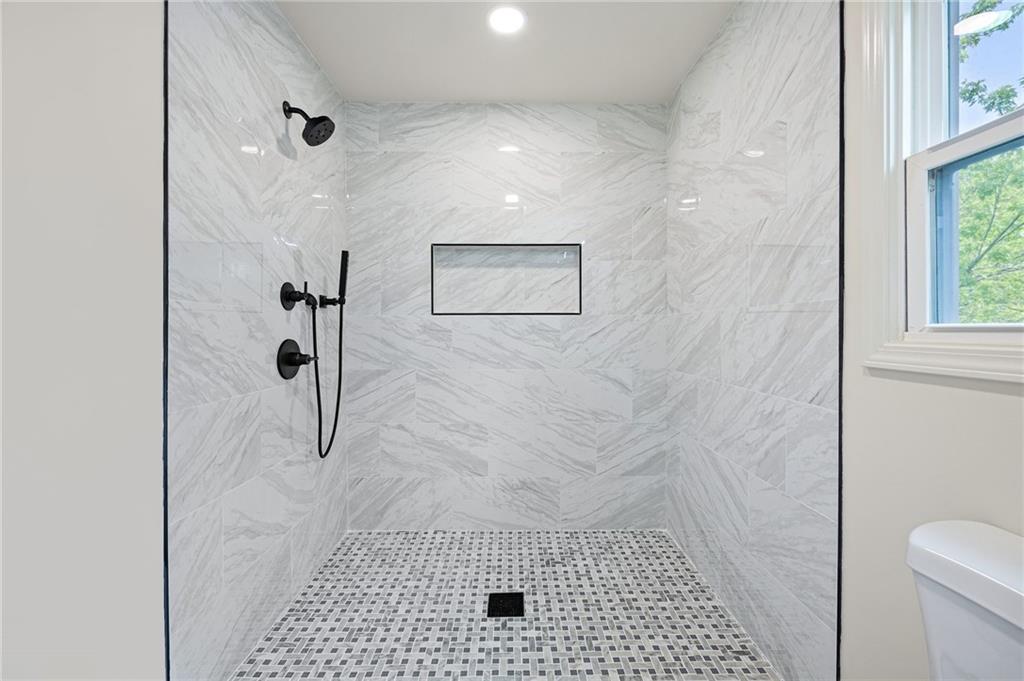 4289 Kimball Road Southwest Atlanta, GA 30331 - Photo 14 of 20 a bathroom with a shower