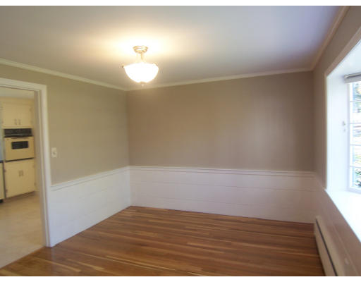 38 Governors Road Milton, MA 02186 - Photo 7 of 15 a view of an empty room and window