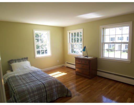 38 Governors Road Milton, MA 02186 - Photo 10 of 15 a bedroom with a bed and a window