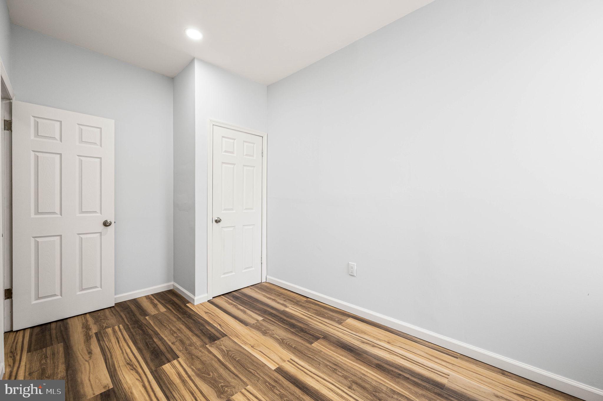 2139 North 10th Street Philadelphia, PA 19122 - Photo 16 of 20 a view of a room with wooden floor and closet area