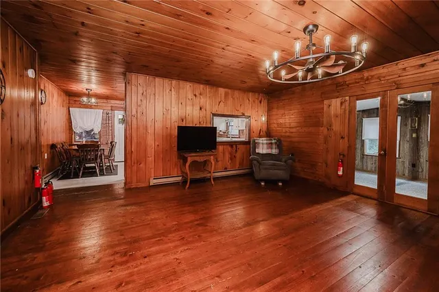 a bedroom with a bed and a mirror