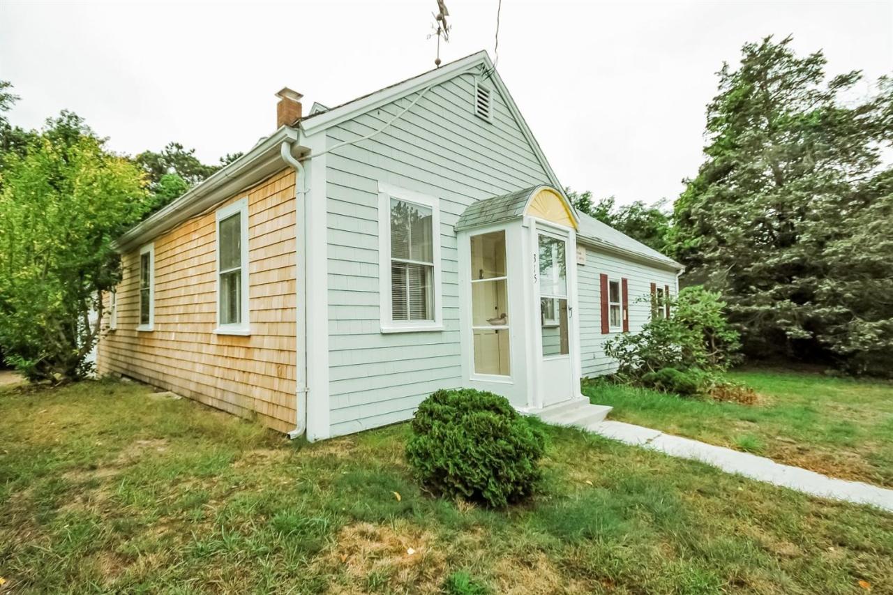 315 Samoset Road Eastham, MA 02642 - Photo 1 of 28 a view of a house with a yard
