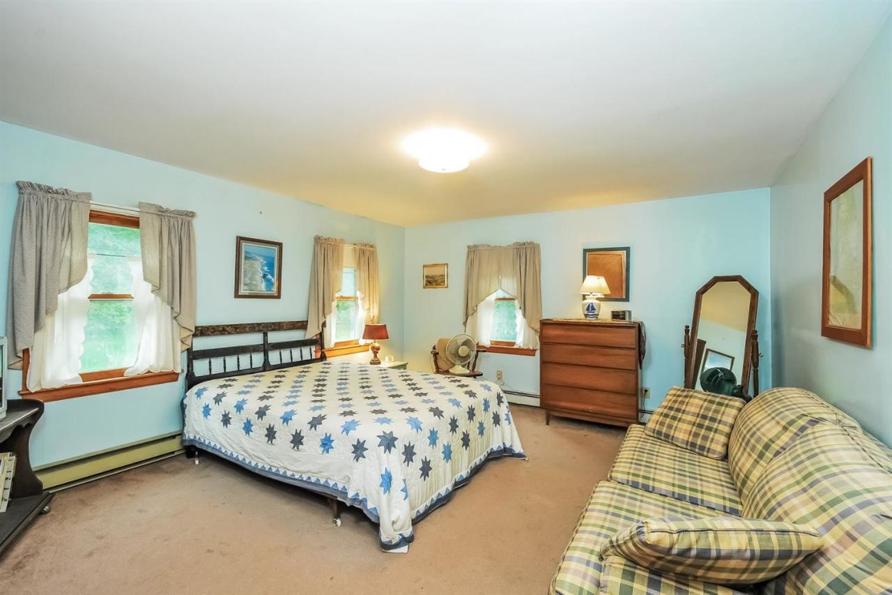 315 Samoset Road Eastham, MA 02642 - Photo 11 of 28 a bedroom with bed and window