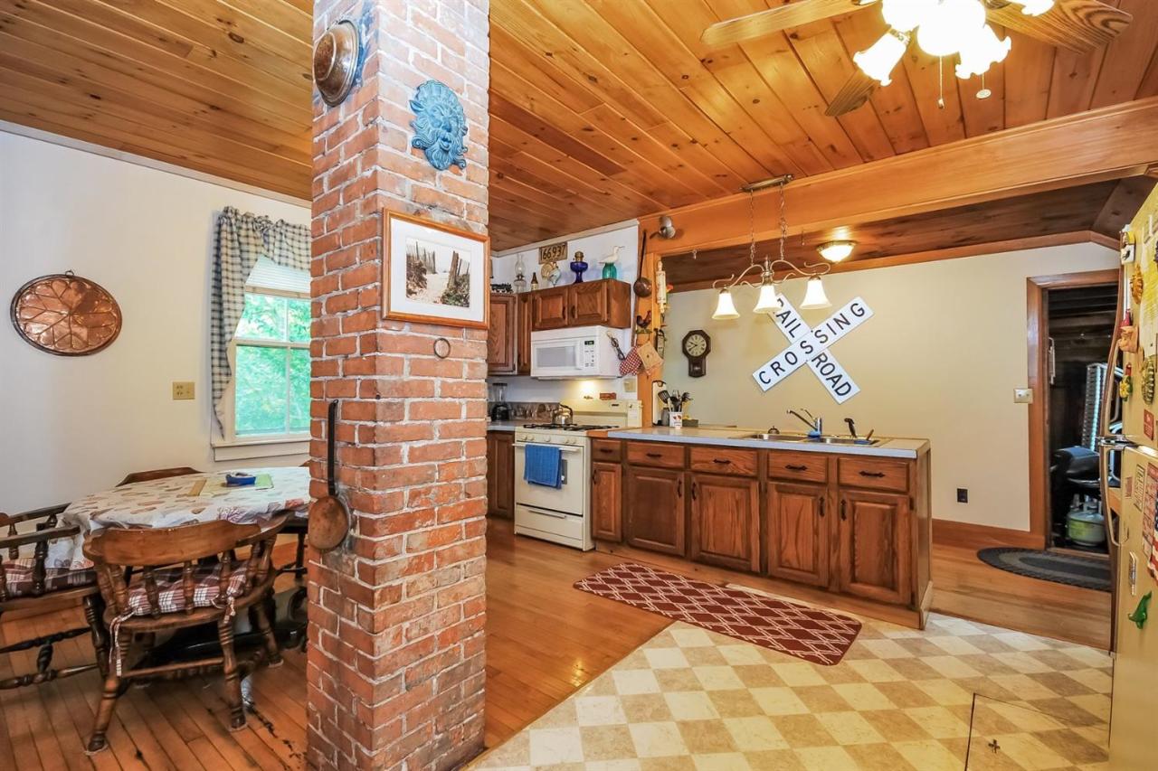 315 Samoset Road Eastham, MA 02642 - Photo 8 of 28 a kitchen with stainless steel appliances granite countertop a sink and cabinets