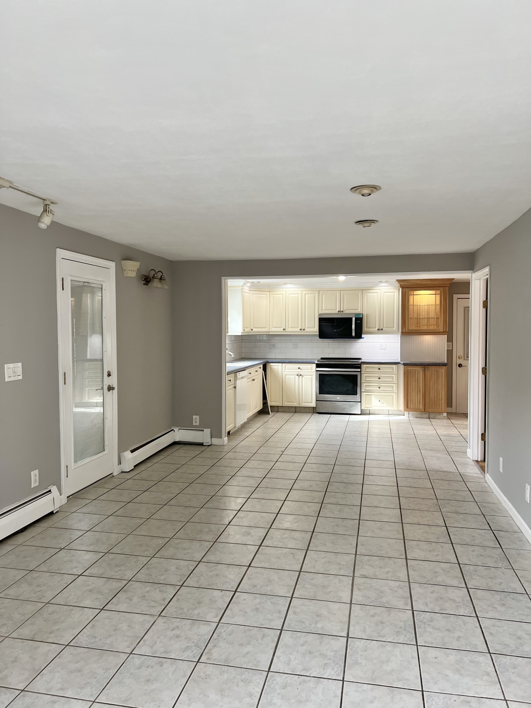 a view of a living room with a large window