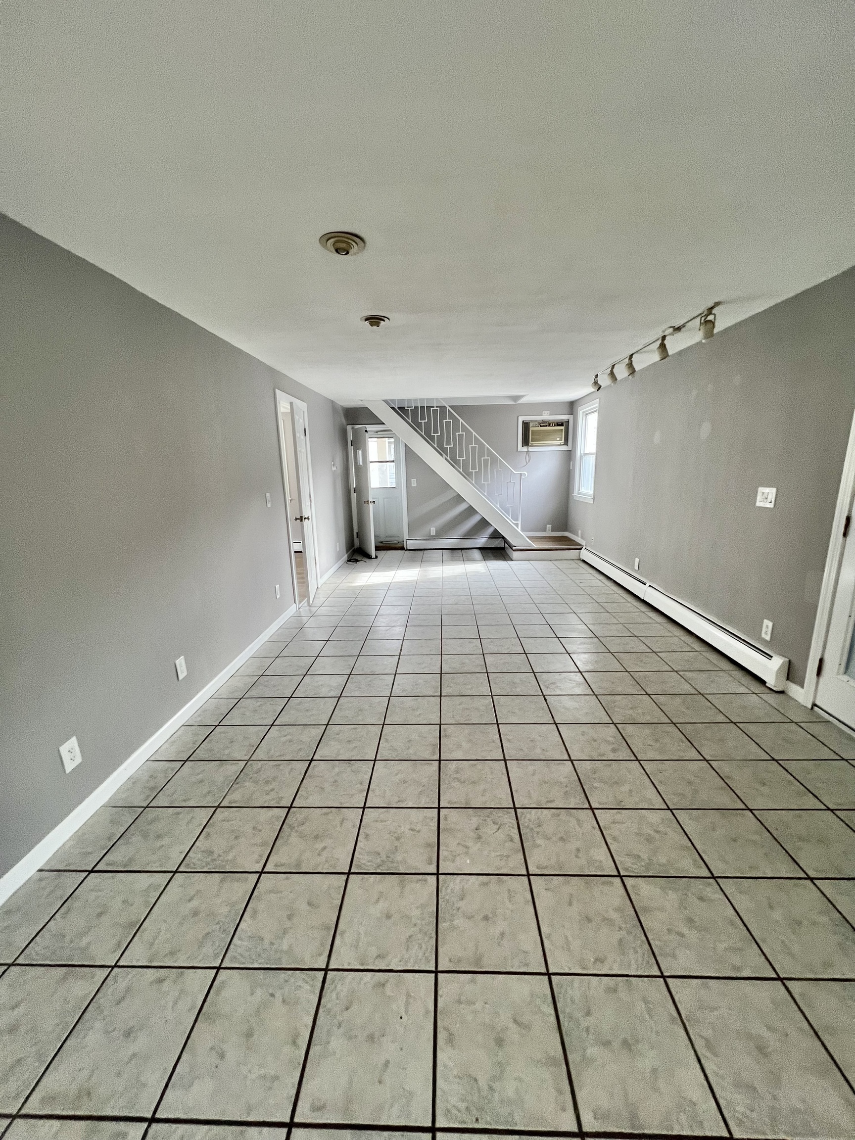 121 North State Street Ansonia, CT 06401 - Photo 22 of 37 a view of an empty room and wooden floor
