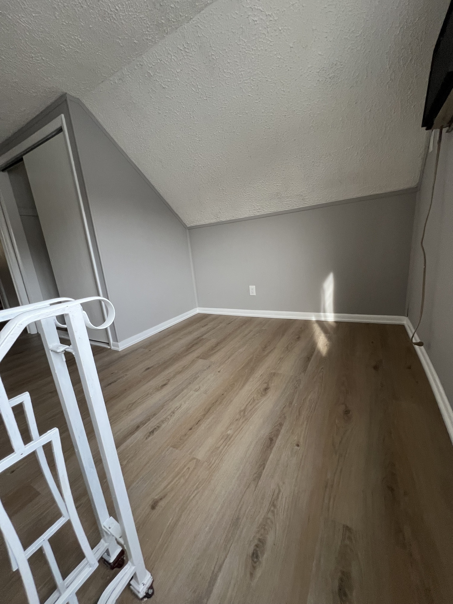 121 North State Street Ansonia, CT 06401 - Photo 29 of 37 a view of an empty room with wooden floor