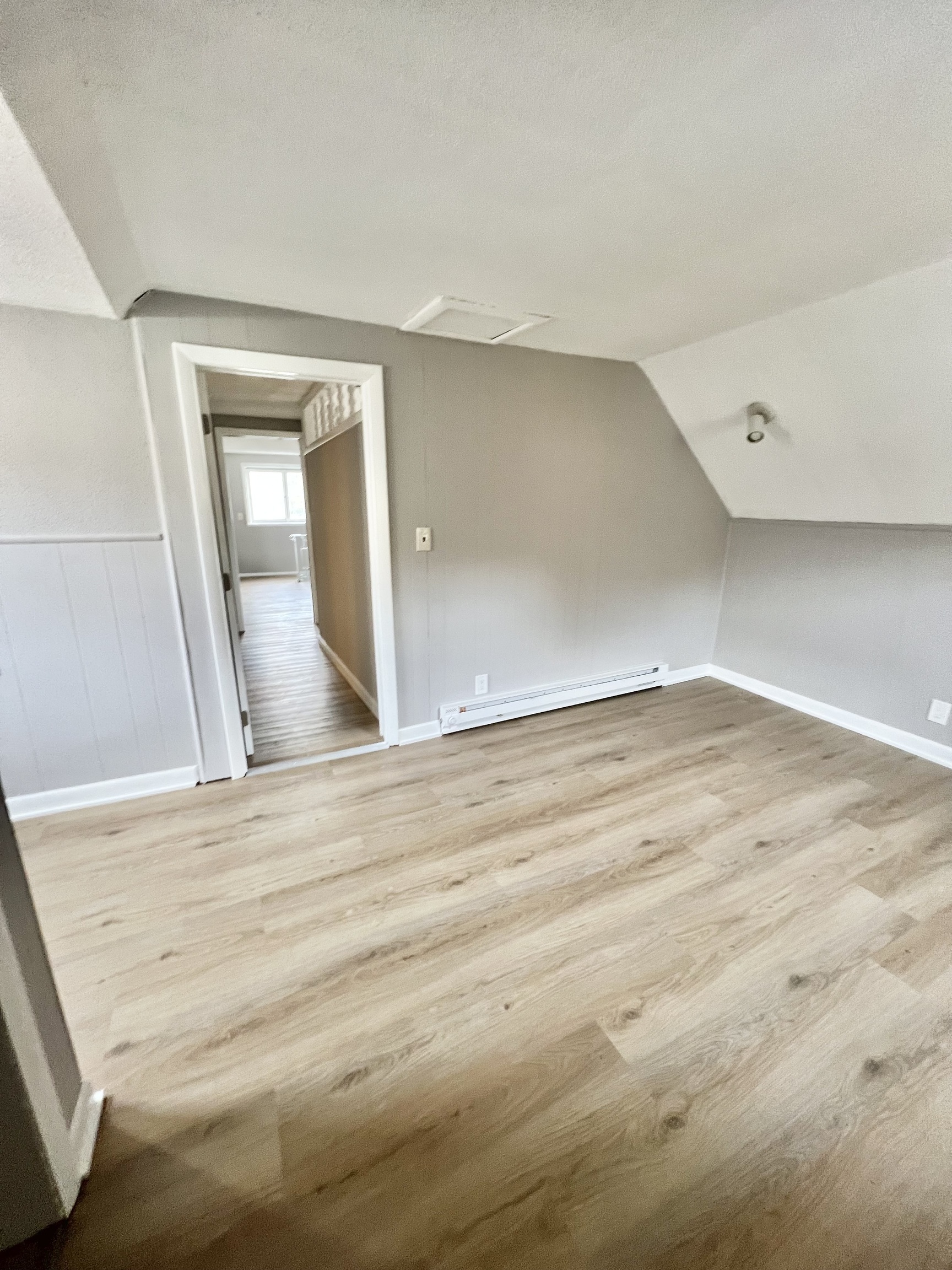 121 North State Street Ansonia, CT 06401 - Photo 36 of 37 a view of wooden floor and cabinet in a room