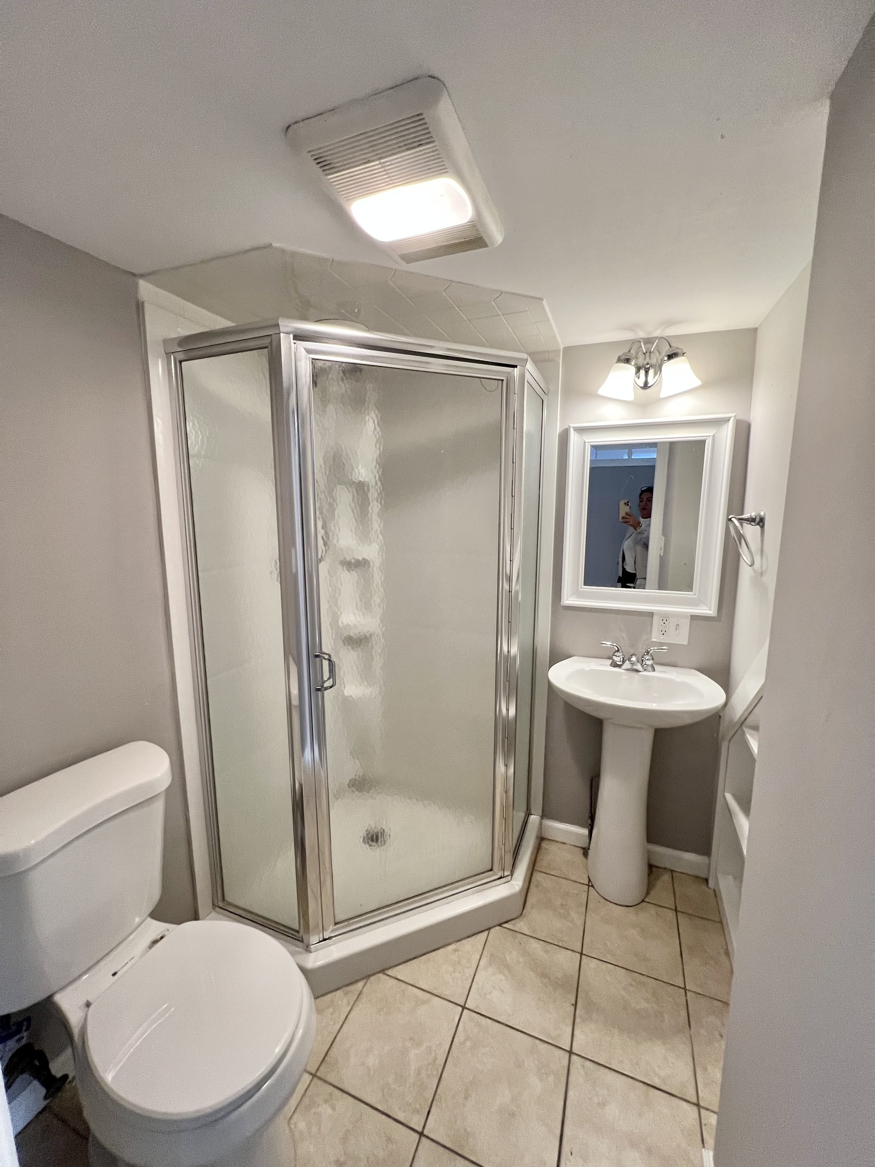 121 North State Street Ansonia, CT 06401 - Photo 37 of 37 a bathroom with a toilet a sink and shower