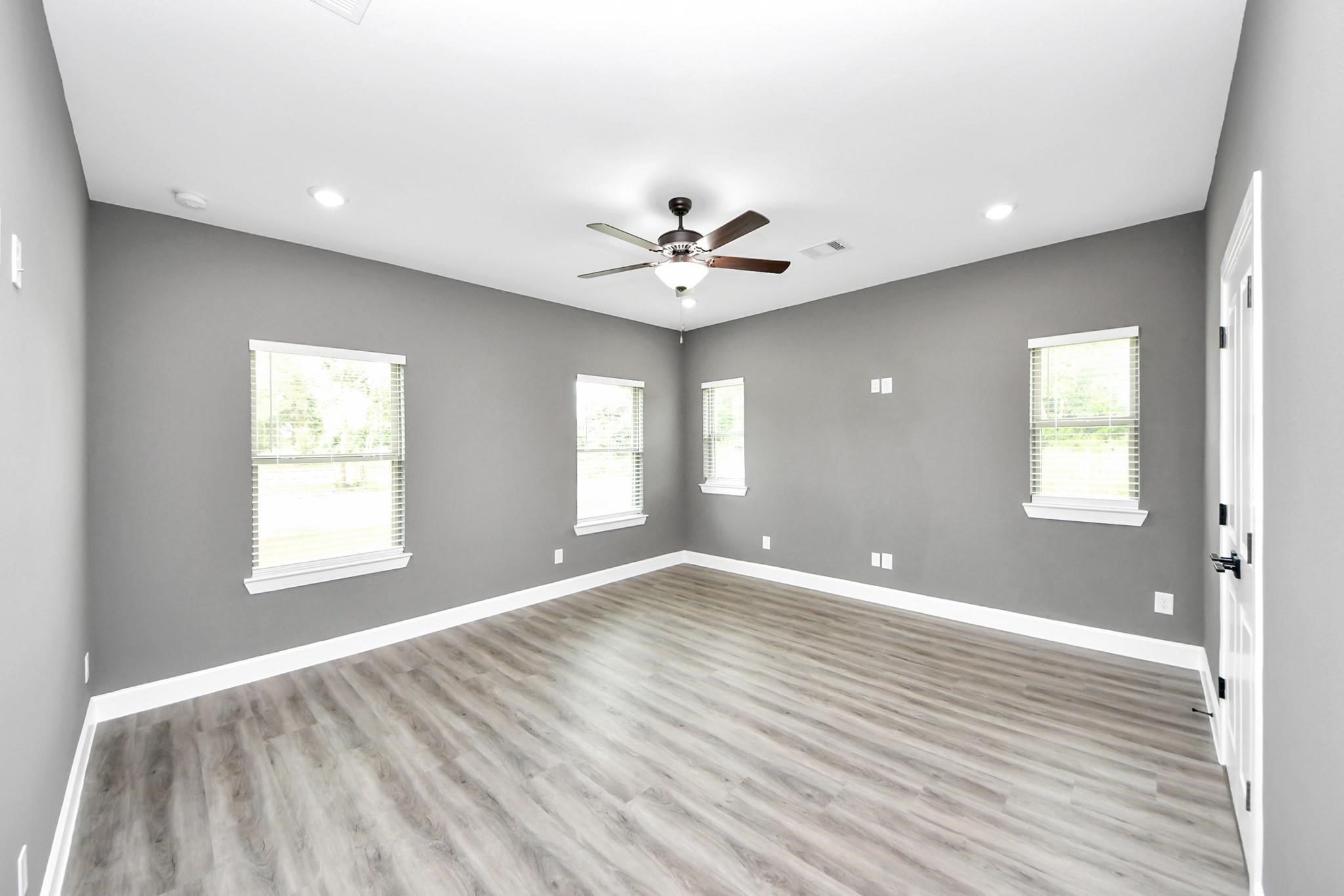 601 Lily Street Prairie View, TX 77484 - Photo 10 of 14 a view of an empty room with a window
