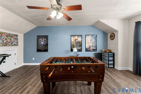 a view of a livingroom with furniture and a window