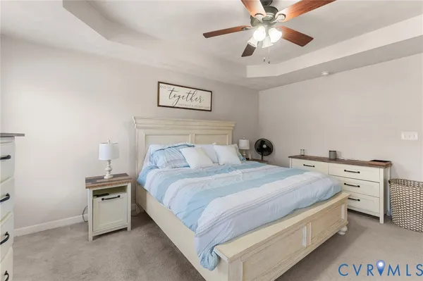 a bathroom with a double vanity sink mirror and toilet
