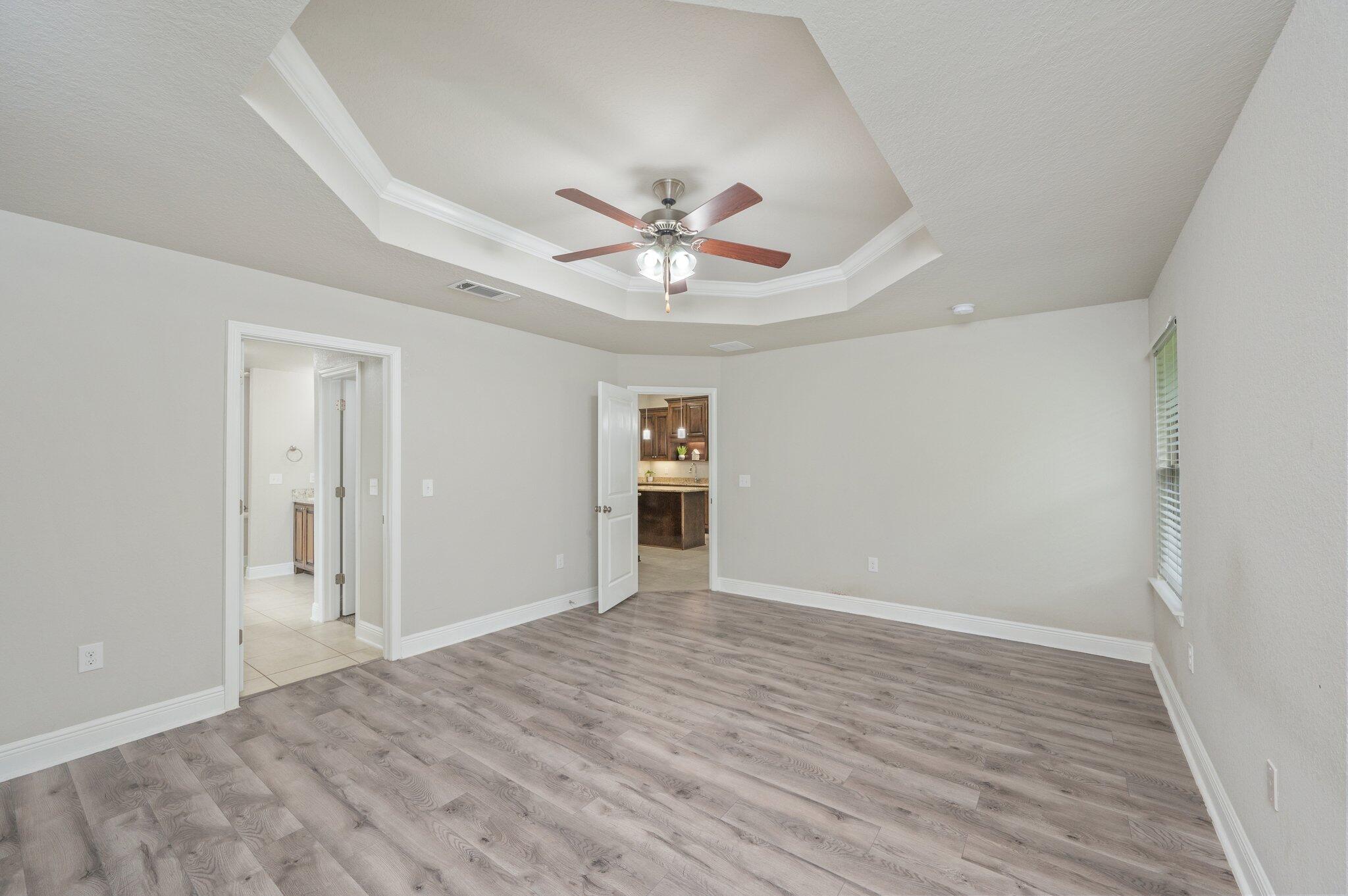 605 Terrier Trail Crestview, FL 32536 - Photo 23 of 46 a view of an empty room with a window